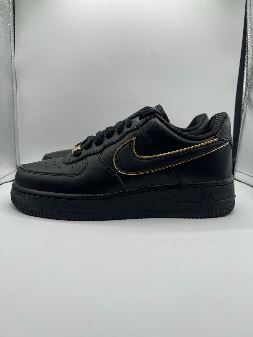 Nike Air Force 1 Low ‘07 Essential “Black Gold Swoosh” size 7.5 women’s used